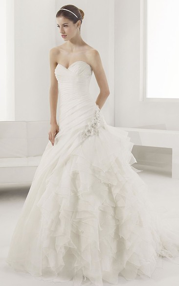 Sweetheart Mermaid Bridal Gown With Flowers And Tiered Skirt