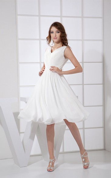 Sleeveless Knee-Length Low-V-Back Pleats and Dress With Ruching