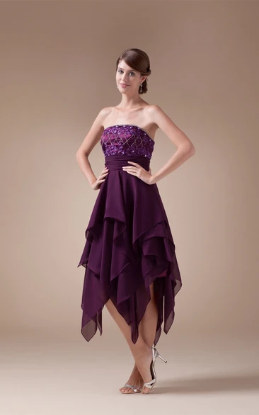Sleeveless Layered Tea Length Dress With Beadings and Cinched Waistband