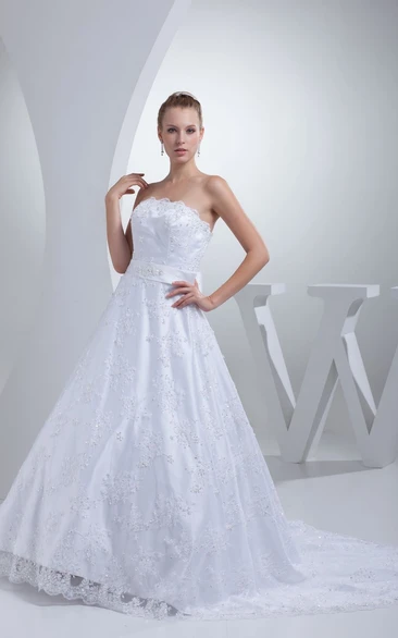 Strapless Appliqued A-Line Gown With Bow and Beading