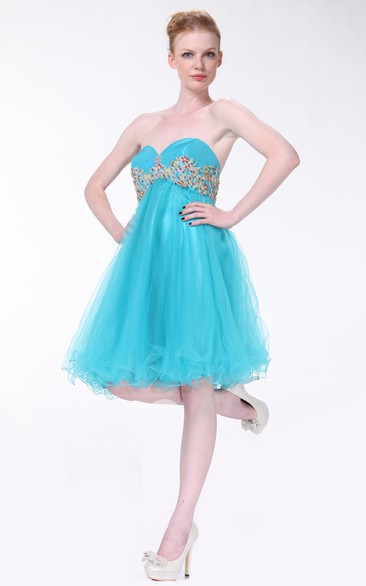 A-Line Knee-Length Sweetheart Sleeveless Empire Dress With Ruffles And Beading