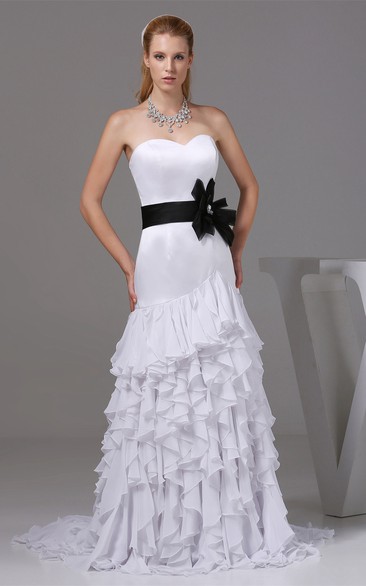 Sleeveless Mermaid Cascading Ruffles and Gown With Bow