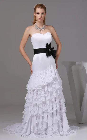 Sleeveless Mermaid Cascading Ruffles and Gown With Bow