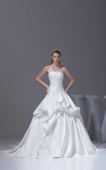 Ruched Criss Cross Sleeveless Bodice Gown With Ruffles and Embellishment